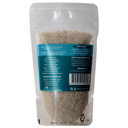 Back of a 200g HealthStack celtic salt in a resealable and recyclable plastic pouch. Details of potential health benefits, ingredients, nutritional information, company details and barcode.